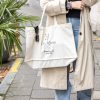 exclujess shopping bag beige quote groot